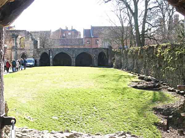 Looking into the Library Grounds through the Medieval Walls and towards St Leonards.