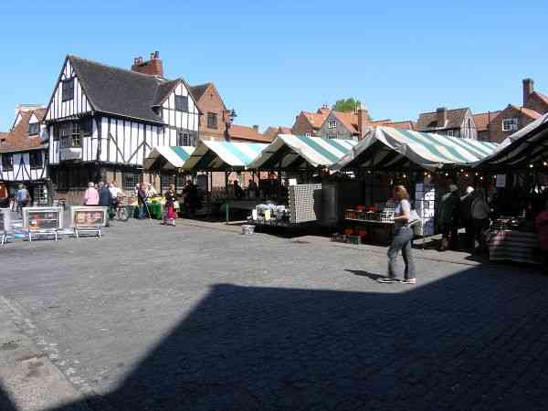Looking north west past south west end of the market.