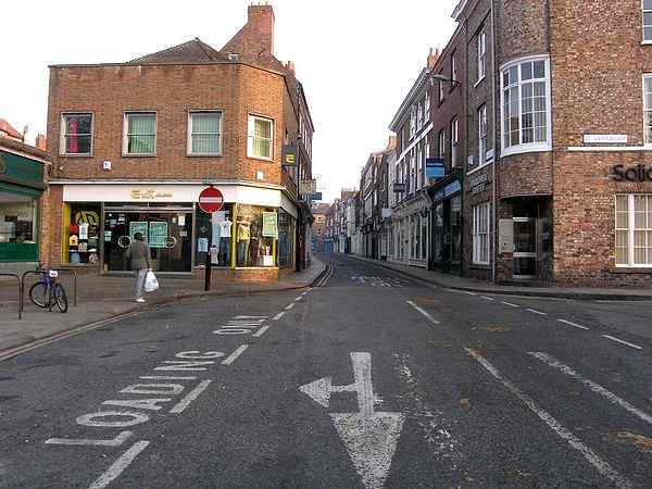 Ahead is Colliergate, to the right is St Saviourgate and to the left is St Crux's Lane.
